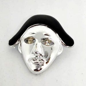 harlequin mask pin with zirconia eyes 1 inch